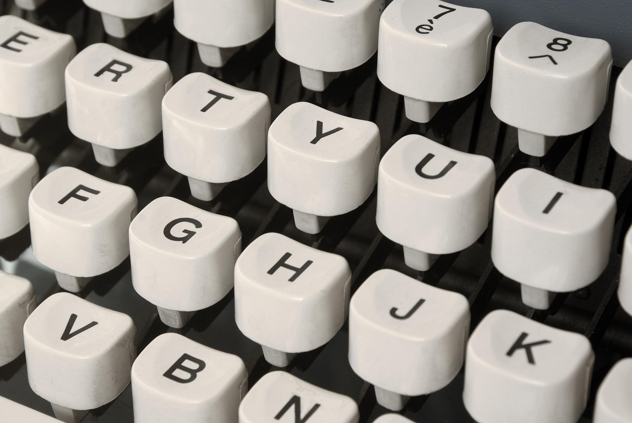 developer typing code laptop