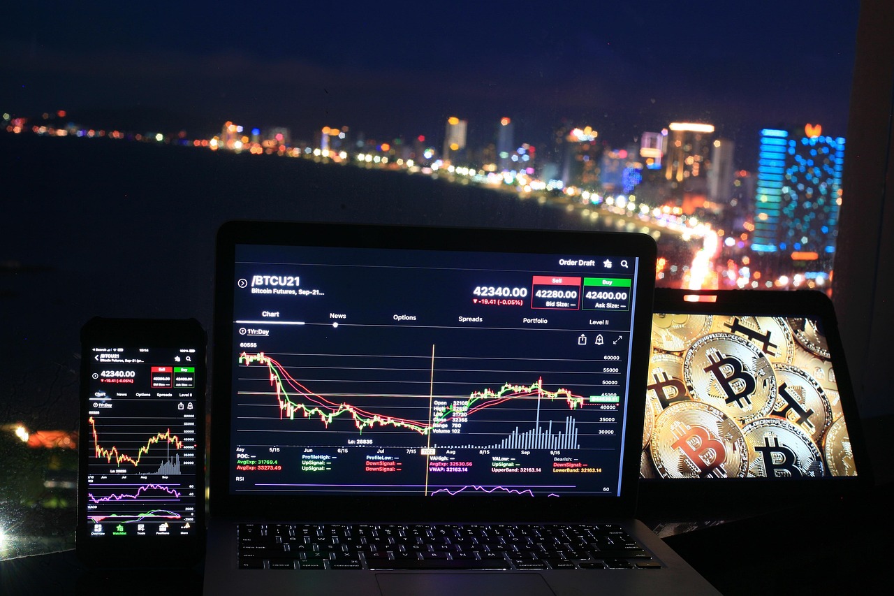 bitcoin and ethereum coins on desk