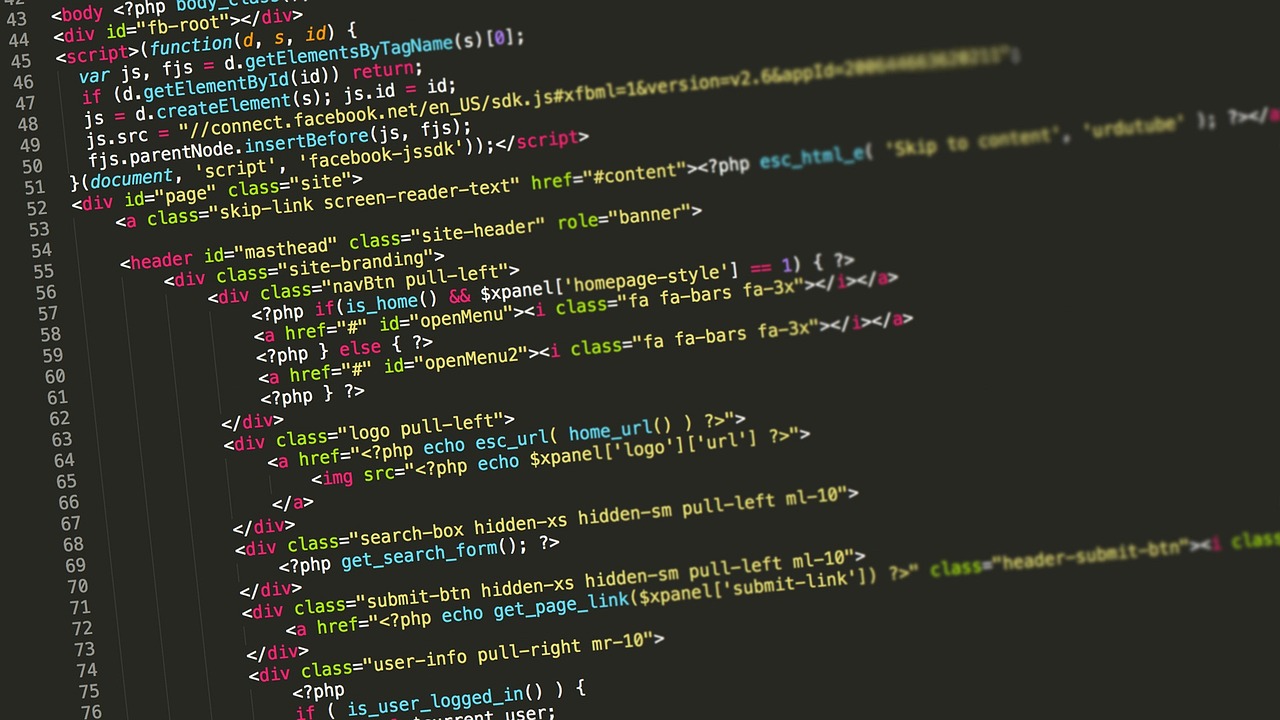 developer typing code laptop